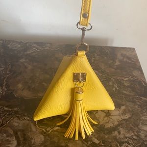 Yellow triangular wristlet